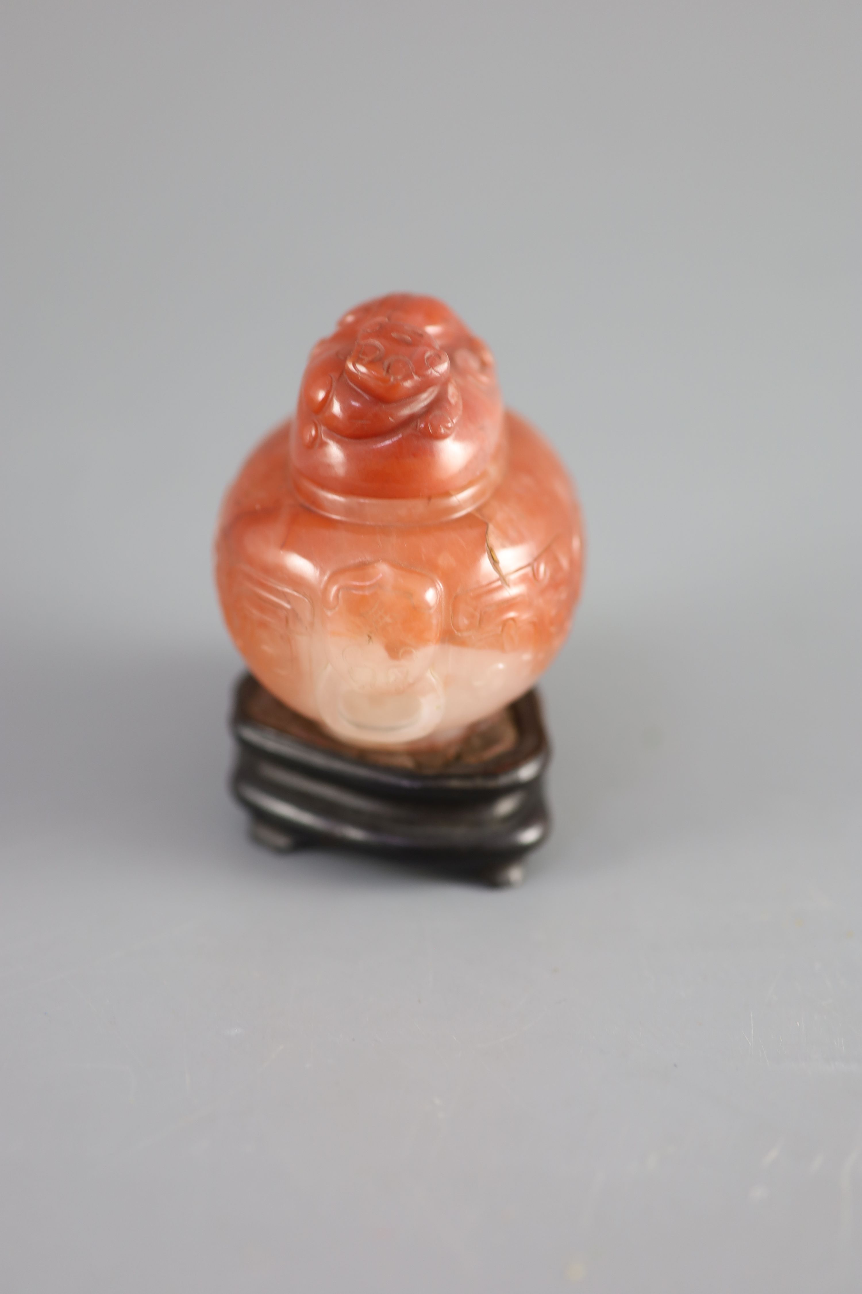 A small Chinese cornelian jar and cover, Qing dynasty, 18th/19th century, height 2.5in.